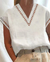 Skjorta med v-ringad spets krage